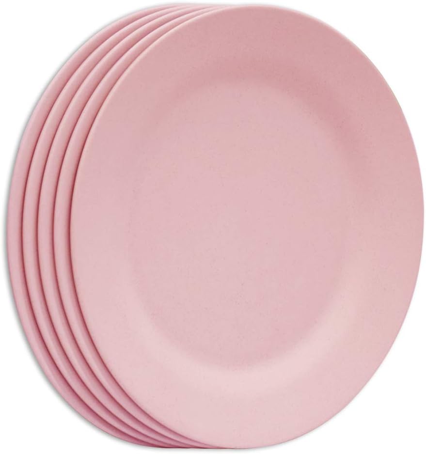 A stack of five pink plates.