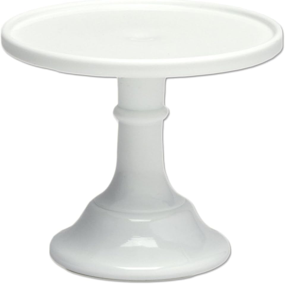 White ceramic cake stand with a round top and a pedestal base.