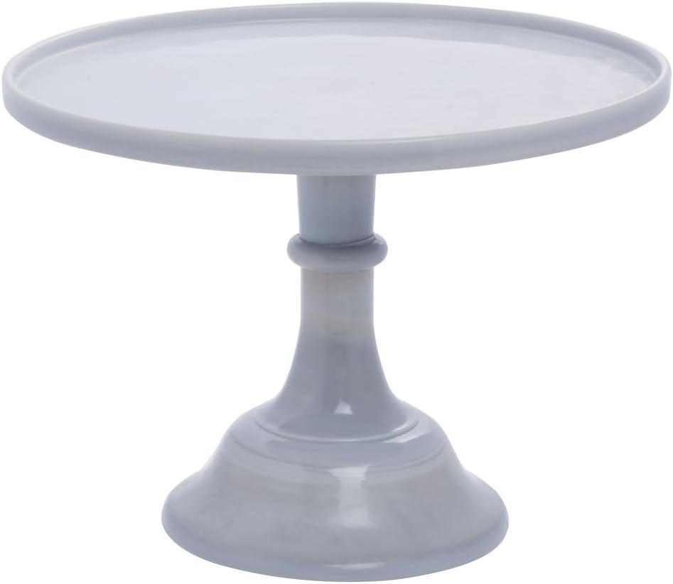 A plain, round, gray ceramic cake stand with a wide base and a flat top, perfect for displaying Valentine's Day Sugar Cookies, shown on a white background.