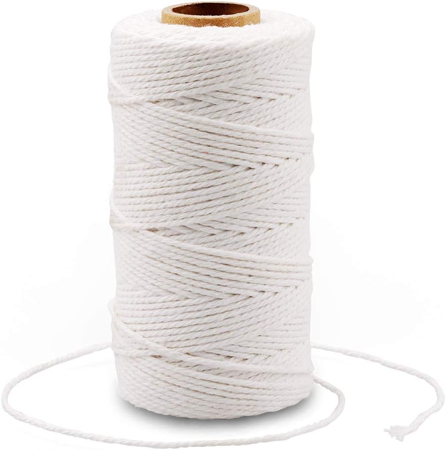 A spool of white twisted rope with a loose end.