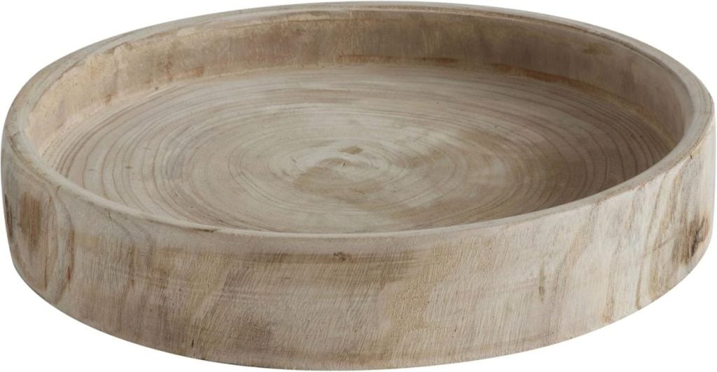 Round wooden tray with a shallow, smooth finish.