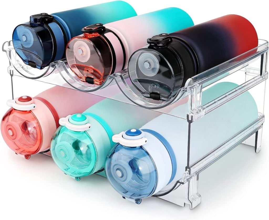 Six colorful water bottles, essential kitchen items, are stored horizontally on a two-tiered transparent rack.