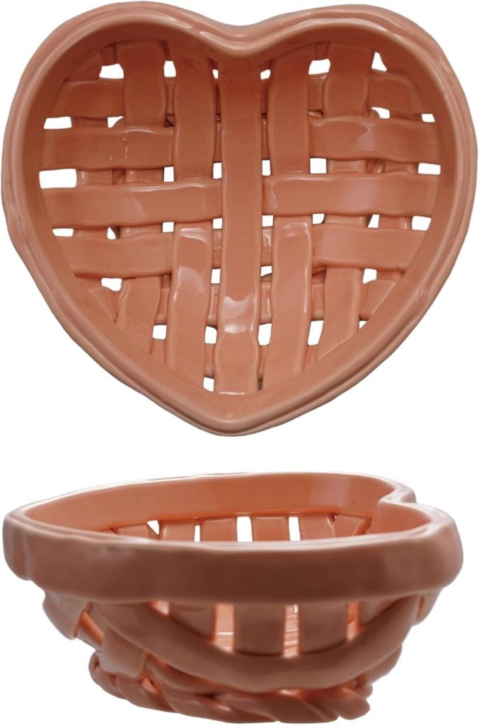 A heart-shaped ceramic basket with a woven design, shown from the top and at an angled side view&mdash;perfect inspiration for air dry clay projects.