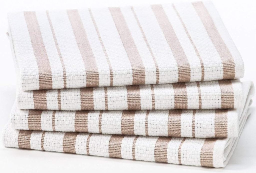 A stack of four folded kitchen towels with beige and white stripes, perfect additions to your collection of essential kitchen items.