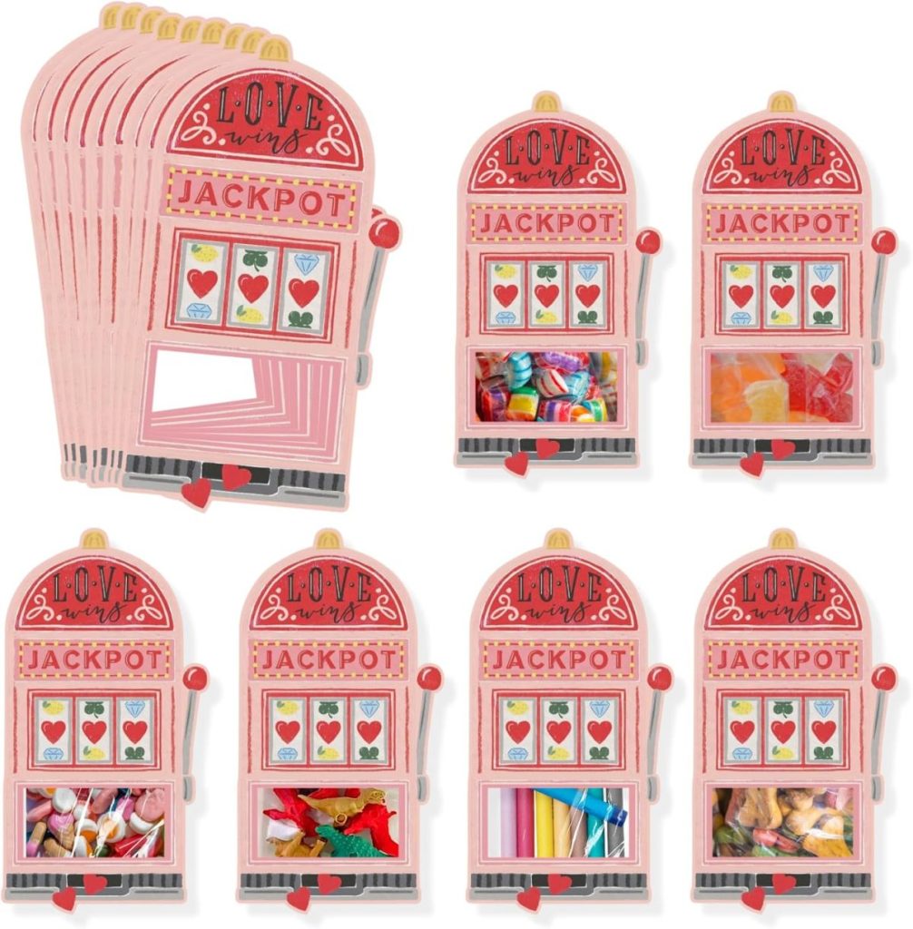 Eight pink slot machine-shaped treat bags, each labeled "Love wins" and "Jackpot," filled with assorted colorful candies&mdash;perfect for pairing with Valentine's Day Cards.