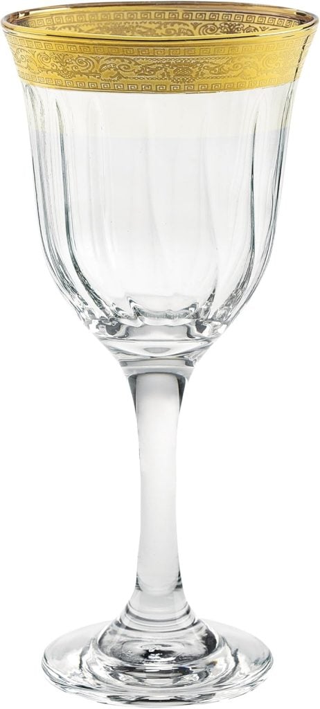 A clear wine glass with a gold decorative rim, perfect for toasting "Happy New Year" in style.