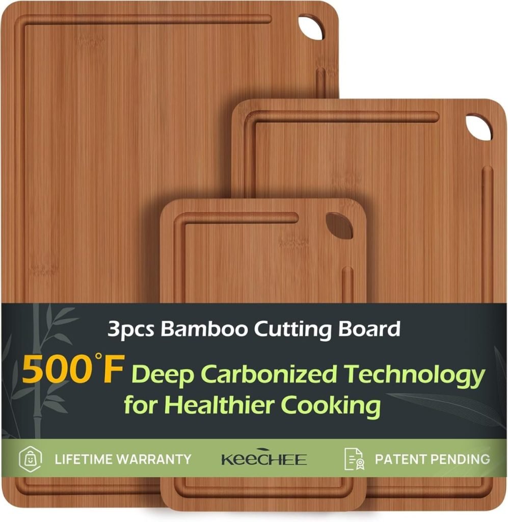 Three bamboo cutting boards of varying sizes, essential kitchen items, boast a label highlighting "500°F deep carbonized technology" for healthier cooking.