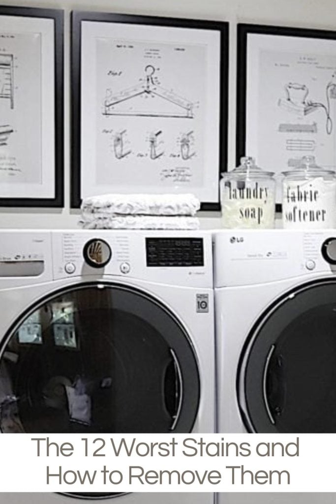 A laundry room with a washer and dryer, three framed pictures on the wall, and jars labeled "laundry soap" and "fabric softener.