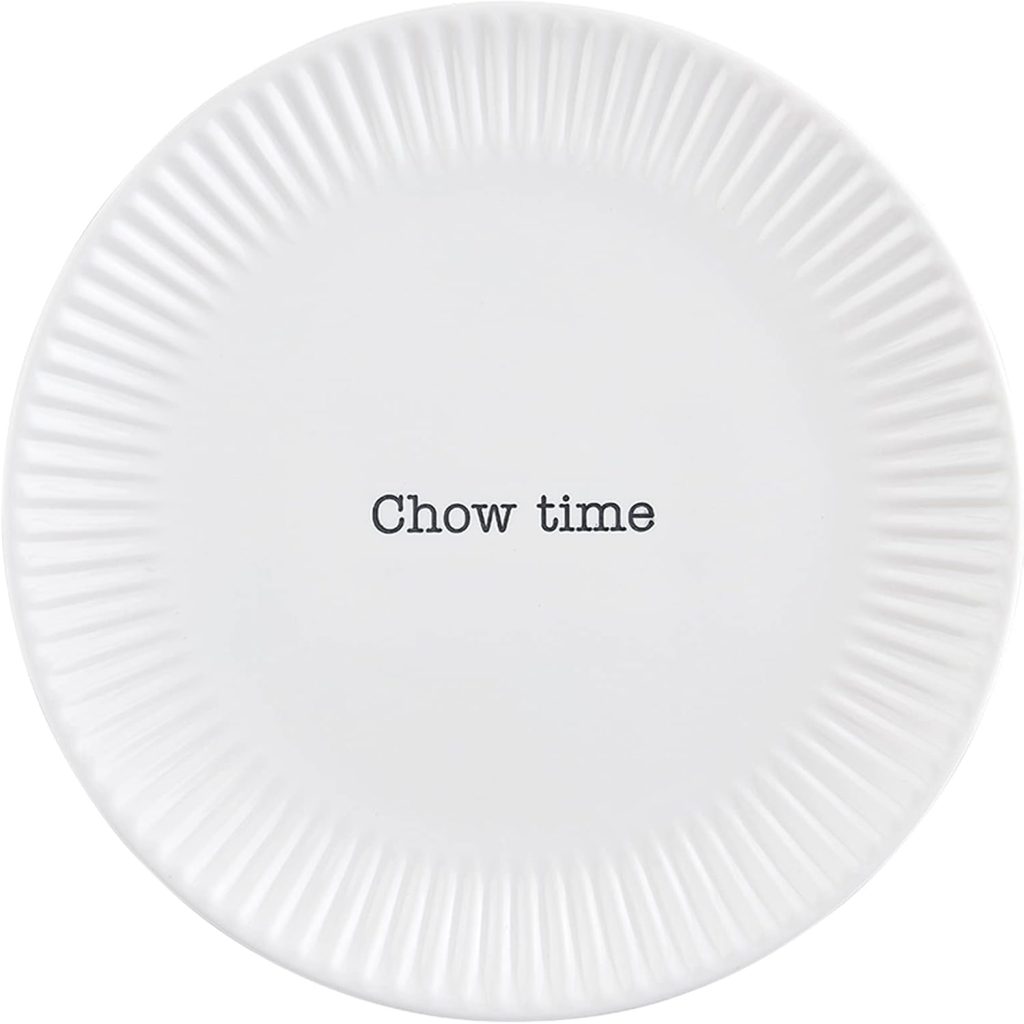 A white ceramic plate with fluted edges, perfect for serving baked brie with jam, features the words "Chow time" printed in bold black text at the center.