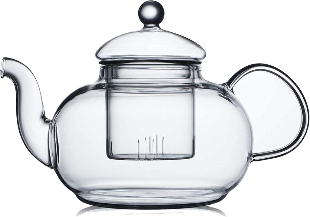 A clear glass teapot with a round handle, curved spout, fitted lid, and an internal infuser for loose leaf tea—perfect for pairing with cranberry orange scones.