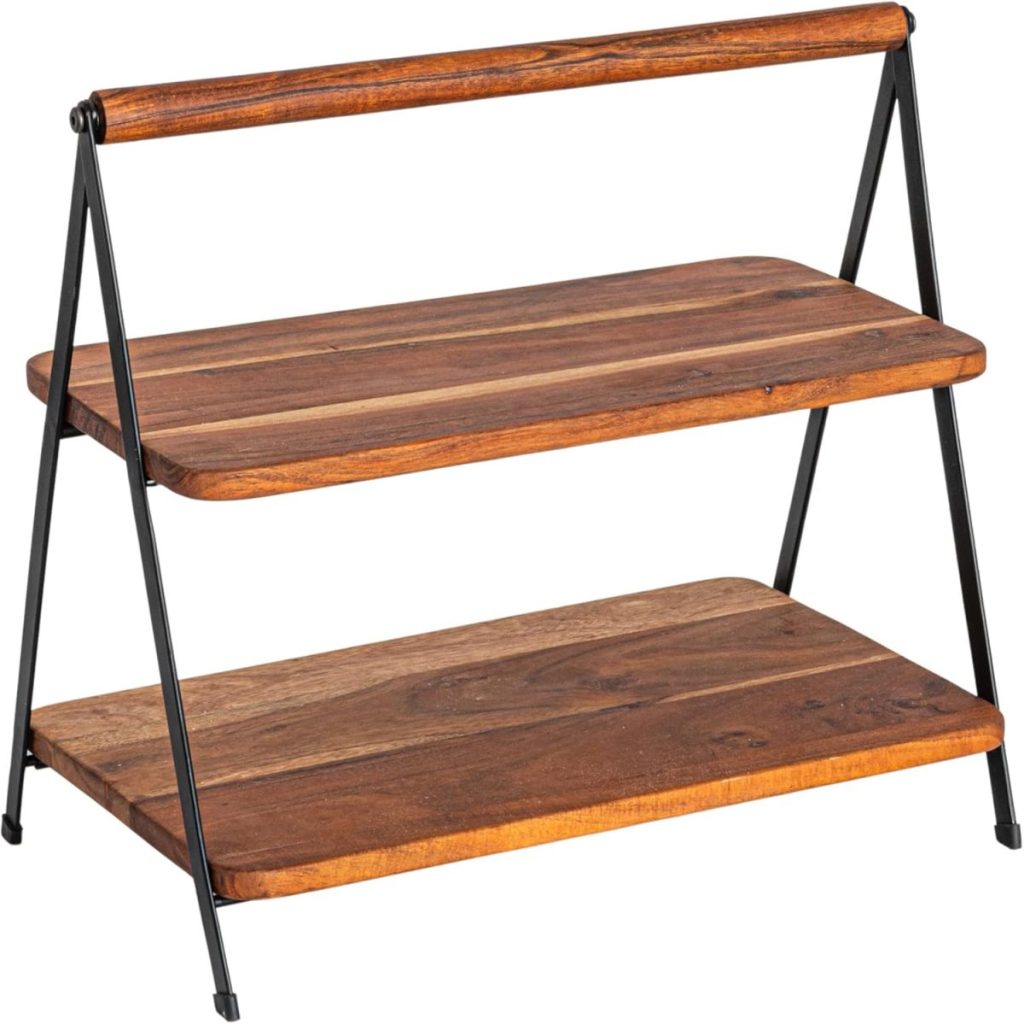 A two-tier wooden shelf with black metal frame and a wooden handle on top, perfect for countertop storage or stylishly displaying treats like cranberry orange scones.