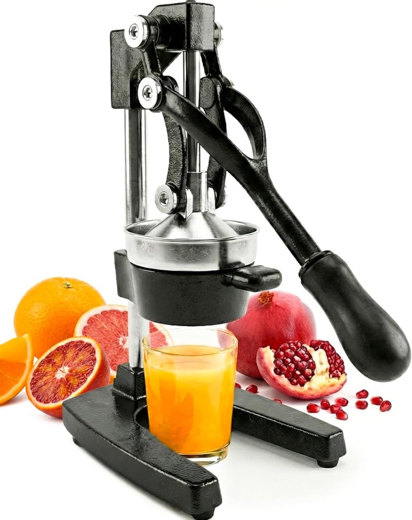 A manual citrus juicer with a glass of juice, surrounded by an orange, blood orange, grapefruit, pomegranate, and the ingredients for a tangy citrus cream pie on a white background.
