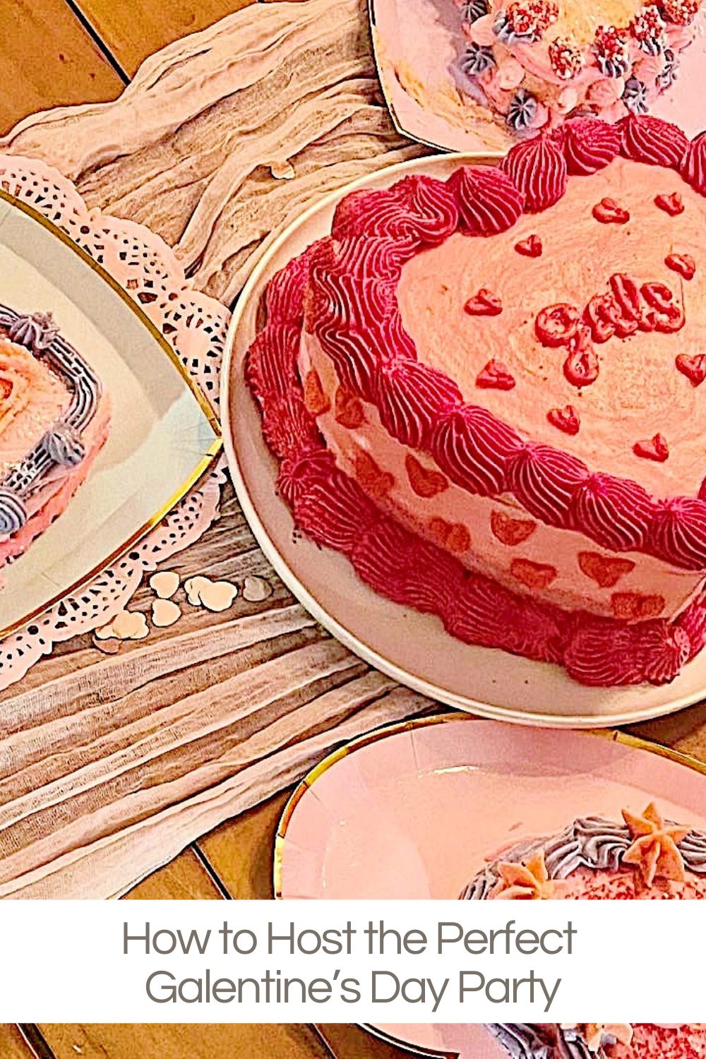 A pink frosting cake adorned with heart decorations sits on a table, flanked by two other beautifully decorated cakes on pink plates. Text below reads, "Your Guide to Hosting the Perfect Galentine's Day Celebration.