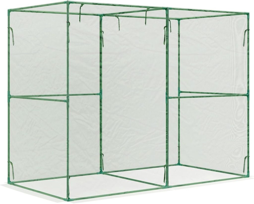 A rectangular greenhouse frame with a green metal structure and transparent plastic covering, featuring an open entryway at the front&mdash;perfect for nurturing your kitchen garden.