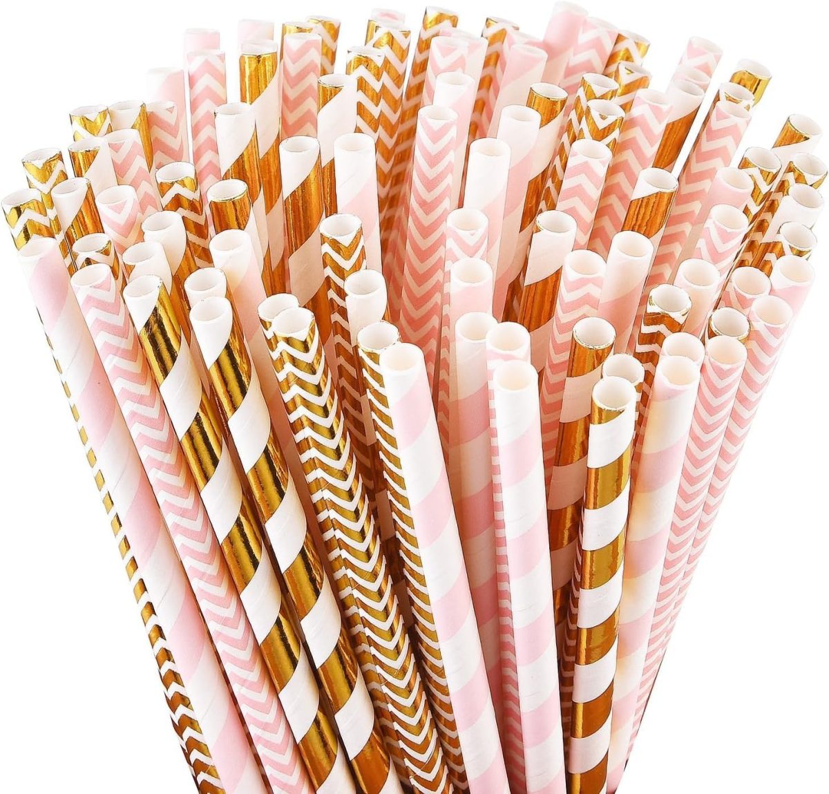 A bundle of paper straws with pink, white, and gold patterns, including stripes, zigzags, and chevrons, arranged upright against a white background.