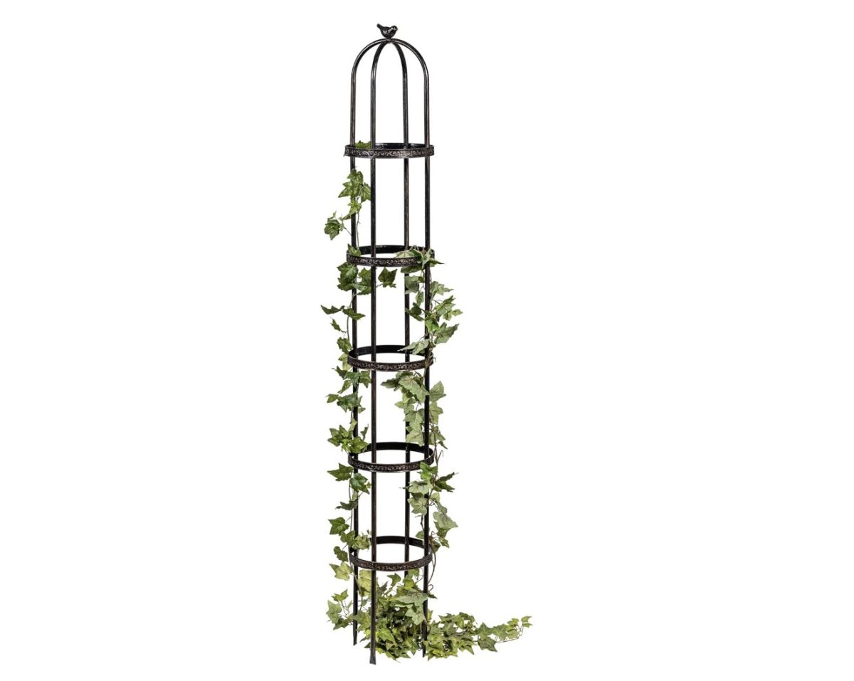 A tall, vertical metal plant stand with five circular shelves is adorned with cascading green ivy, perfect for creating a kitchen garden indoors.