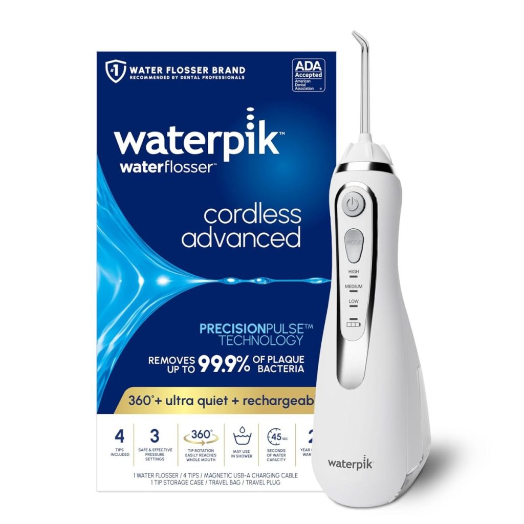 Waterpik Cordless Advanced Water Flosser shown next to its packaging, perfect for freshening your smile before Easter Brunch. Features include precision pulse technology, rechargeable battery, and effective plaque removal.