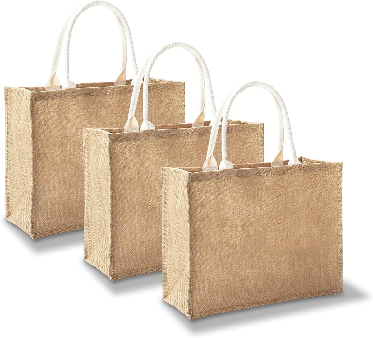 Three plain, rectangular jute tote bags with white handles, arranged side by side on a white background.