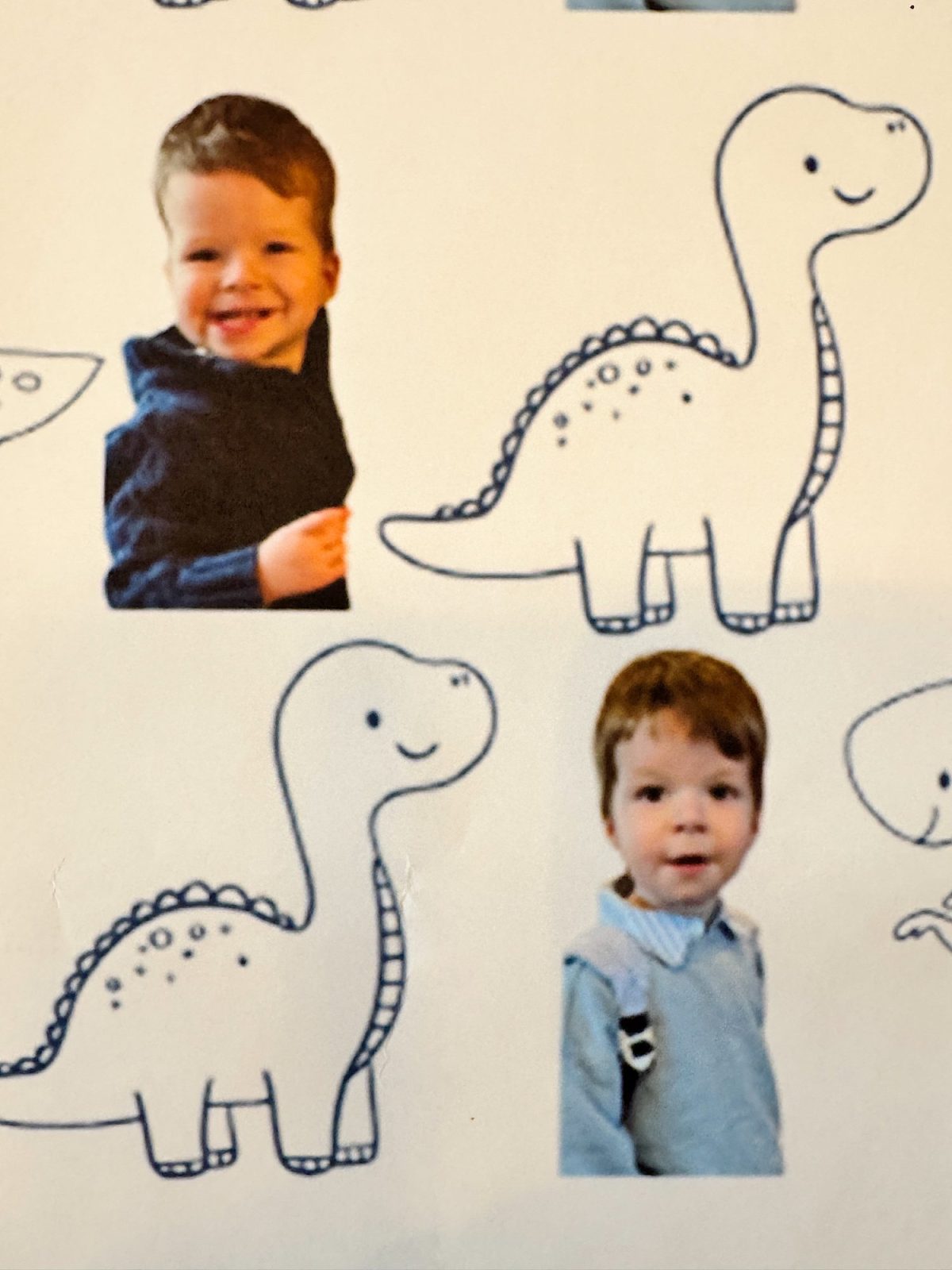 Two young children are pictured surrounded by cartoon dinosaur drawings. One child, wearing a dark top, smiles widely, while the other, in a light top, faces the camera with a neutral expression.
