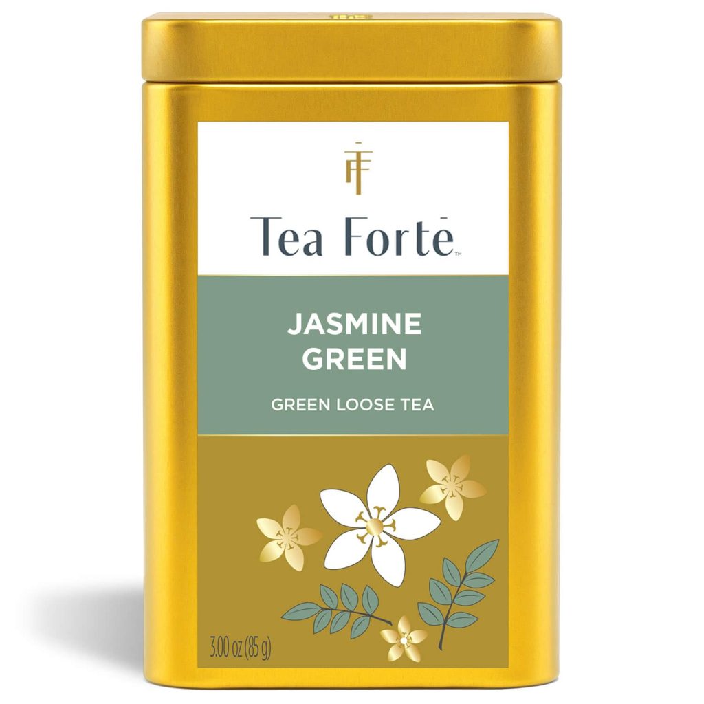 A gold tin of Tea Fort&eacute; Jasmine Green loose tea, with white flowers and leaves illustrated on the label. The 3 oz (85 g) tin offers a delightful alternative to traditional tea bags.