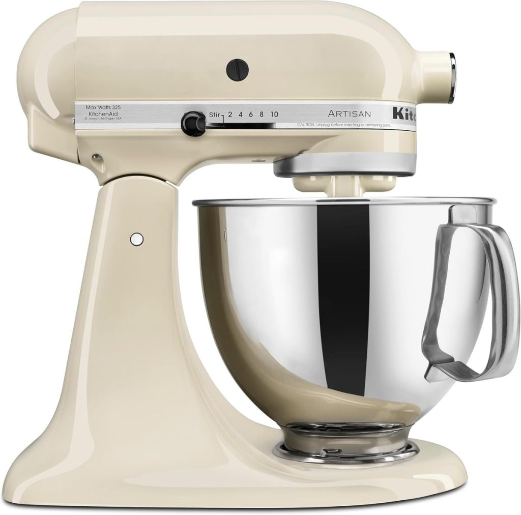 Beige KitchenAid stand mixer with stainless steel mixing bowl, viewed from the side, showing speed controls and handle—perfect for mixing dough or preparing Edible Paper creations.