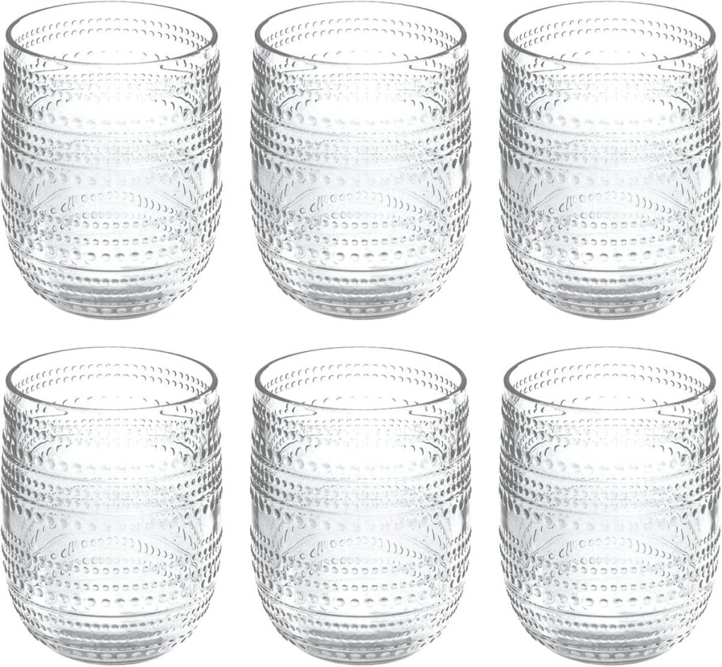 Six clear glass tumblers with a textured dot pattern are arranged in two rows of three against a white background, perfect for serving refreshing summer mocktails.