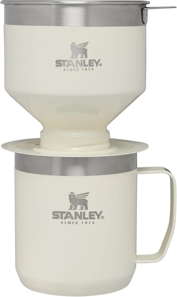 A cream-colored Stanley pour-over coffee maker sits on top of a matching Stanley mug; both feature the Stanley logo and silver accents&mdash;an ideal Amazon Father's Day gift for coffee lovers.