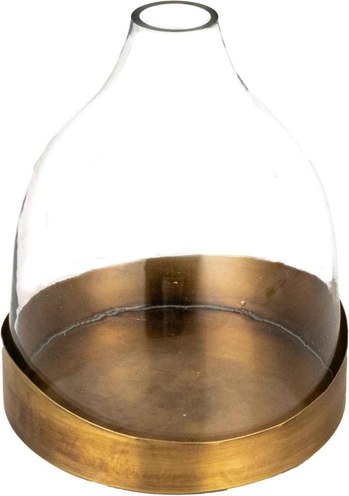 A clear glass cloche with a rounded top, placed on a circular metallic gold base—an elegant accent piece favored by interior designers for stylish displays.