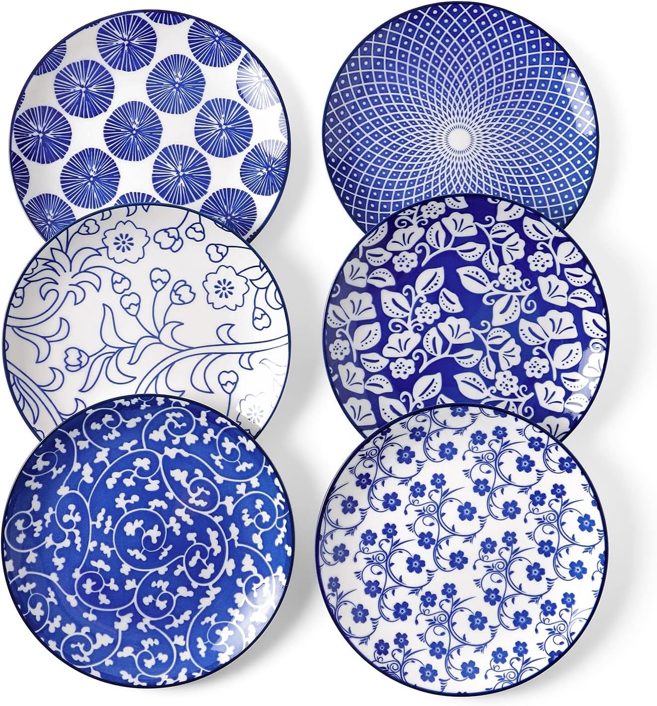 Six ceramic plates with blue and white floral and geometric patterns, perfect for a dinner party, are arranged in two vertical rows on a white background.