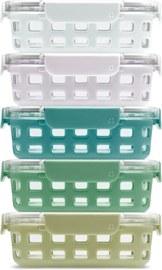 Five rectangular glass food storage containers with lids, each in a different pastel shade, stacked vertically. The containers have a grid-patterned silicone sleeve—perfect for upgrading your kitchen on Amazon Prime Day.