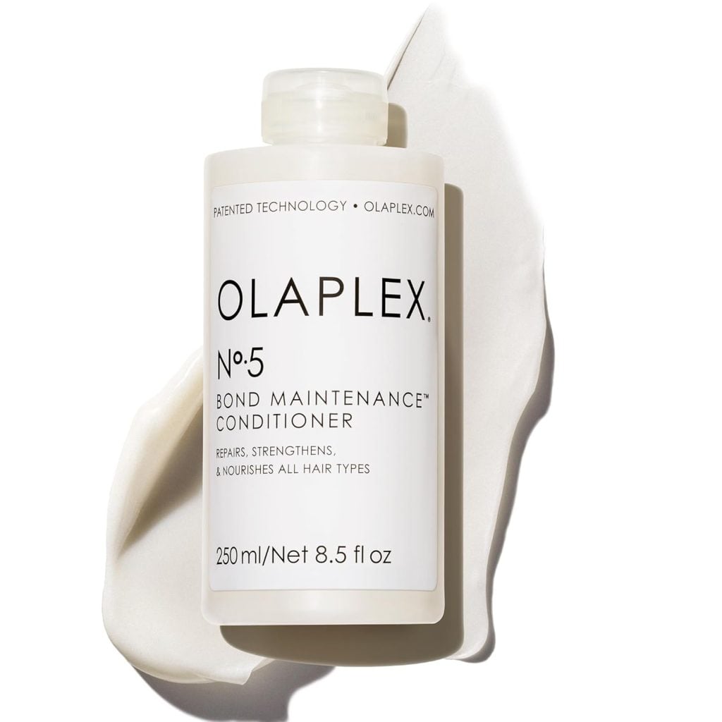 A bottle of Olaplex No. 5 Bond Maintenance Conditioner (250 ml/8.5 fl oz) displayed on a white, satin-like surface&mdash;perfect for scoring during The Best Amazon Prime Day 2025 Deals - Day Four.