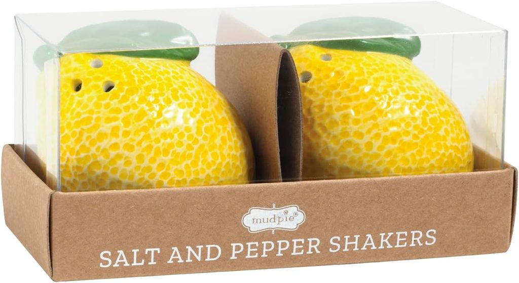 Two yellow ceramic lemon-shaped salt and pepper shakers in clear packaging with a cardboard base labeled "Salt and Pepper Shakers"—a charming touch of lemon decor for your kitchen or dining table.