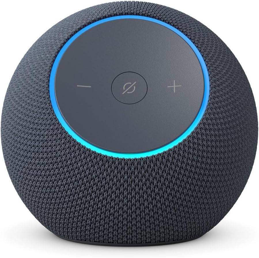 A round smart speaker with a fabric exterior, blue accent light, and touch controls for volume and microphone on the top surface, seamlessly integrates with Amazon Prime for easy access to music and exclusive content.