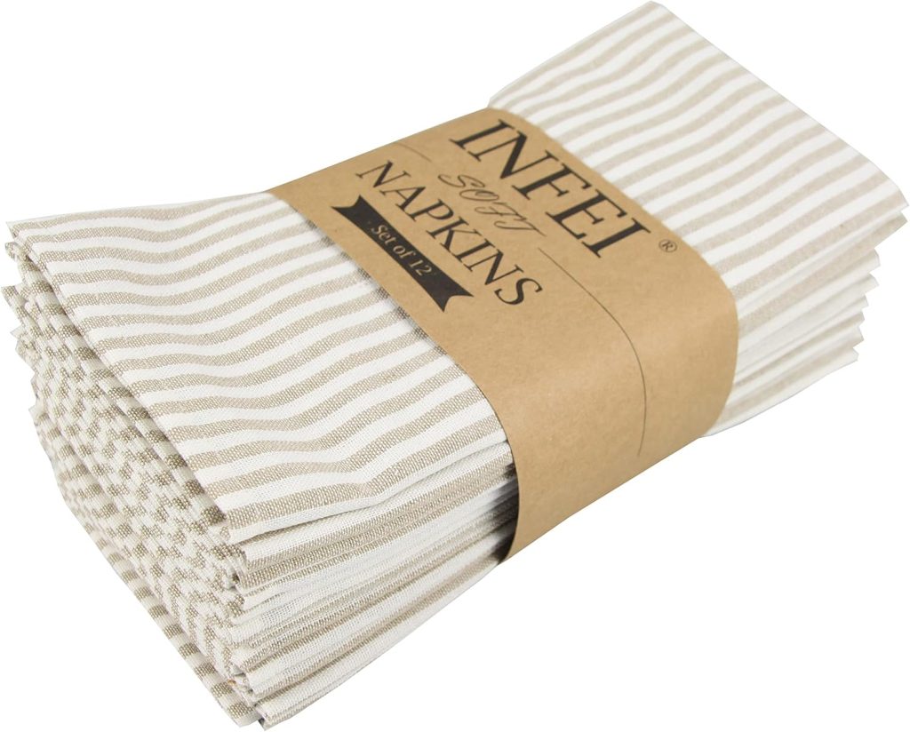 A stack of beige and white striped cloth napkins is bundled together with a brown paper label that reads "INFEI Soft Napkins Set of 12." Perfect for complementing your outdoor grilling station, these napkins add both style and convenience to any gathering.