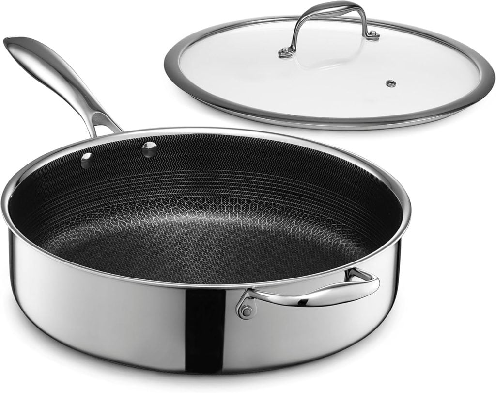 A stainless steel sauté pan with a long handle and glass lid, featuring a nonstick hexagonal-patterned interior—perfect for upgrading your kitchen on Amazon Prime Day.