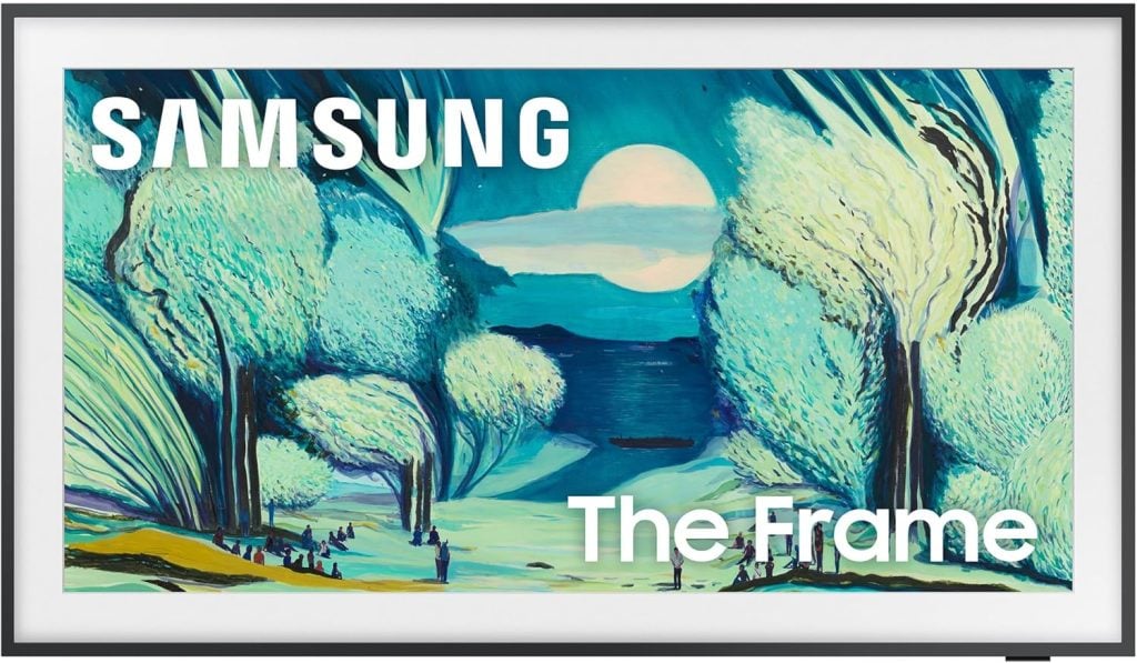 A Samsung The Frame TV displays a digital artwork featuring a moonlit landscape with blue and green trees and a large moon over a lake, perfect for streaming movies on Amazon Prime in style.