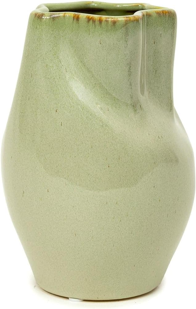 A light green handmade clay ceramic vase with an uneven, wavy rim and a slightly distorted, asymmetrical shape.