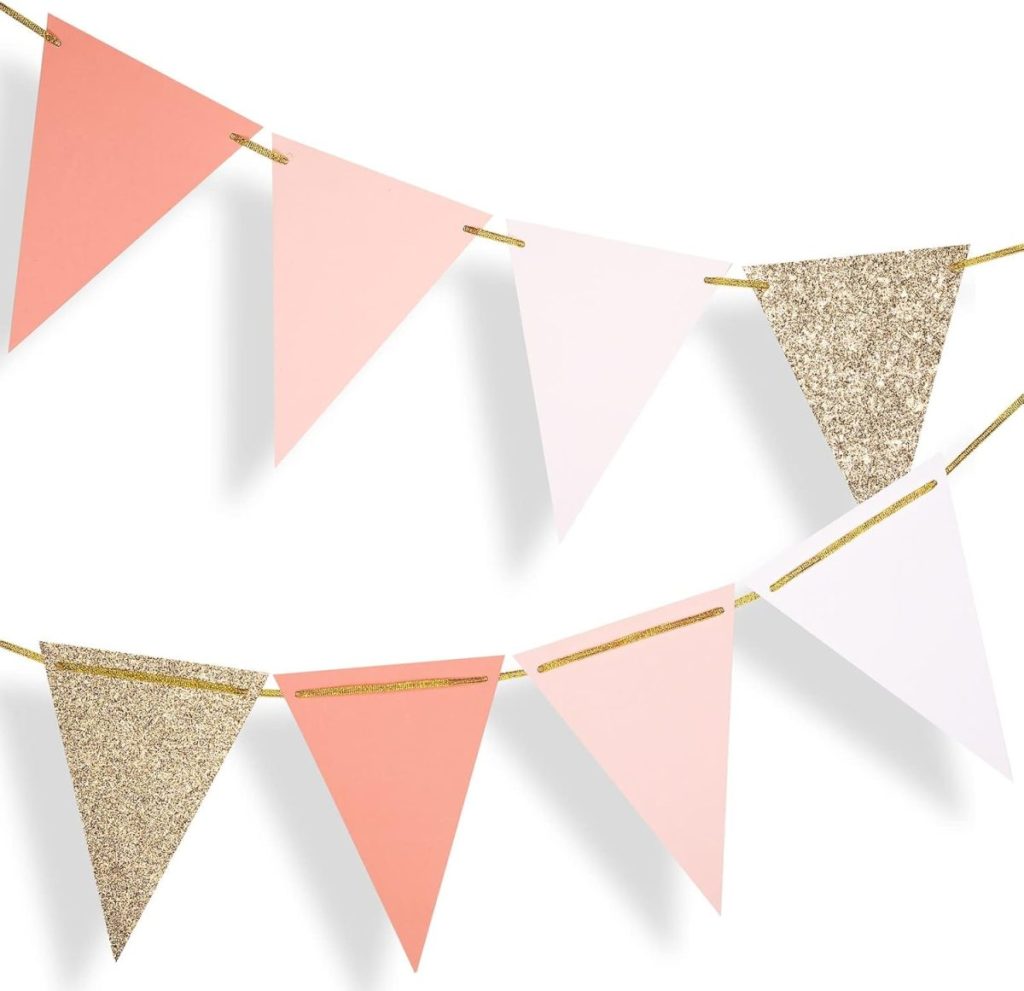 Two strings of triangular bunting flags in pink, white, and gold glitter hang against a white background.