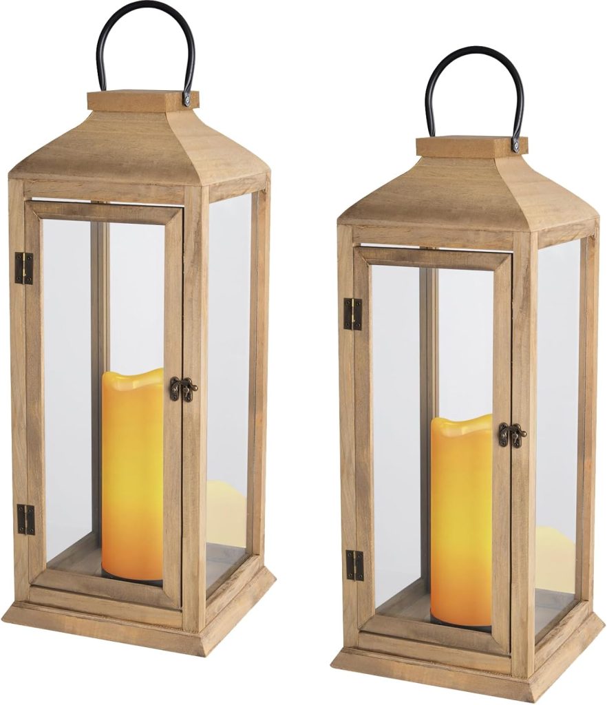 Two rectangular wooden lanterns with glass panels, each containing a flameless LED candle inside, and a black metal handle on top.