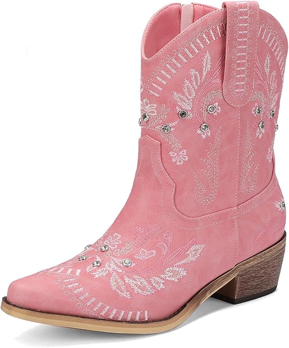 A pink cowboy boot with white embroidered floral patterns, silver studs, pull straps, a pointed toe, and a stacked wooden heel—perfect for making a statement now that fall is here.