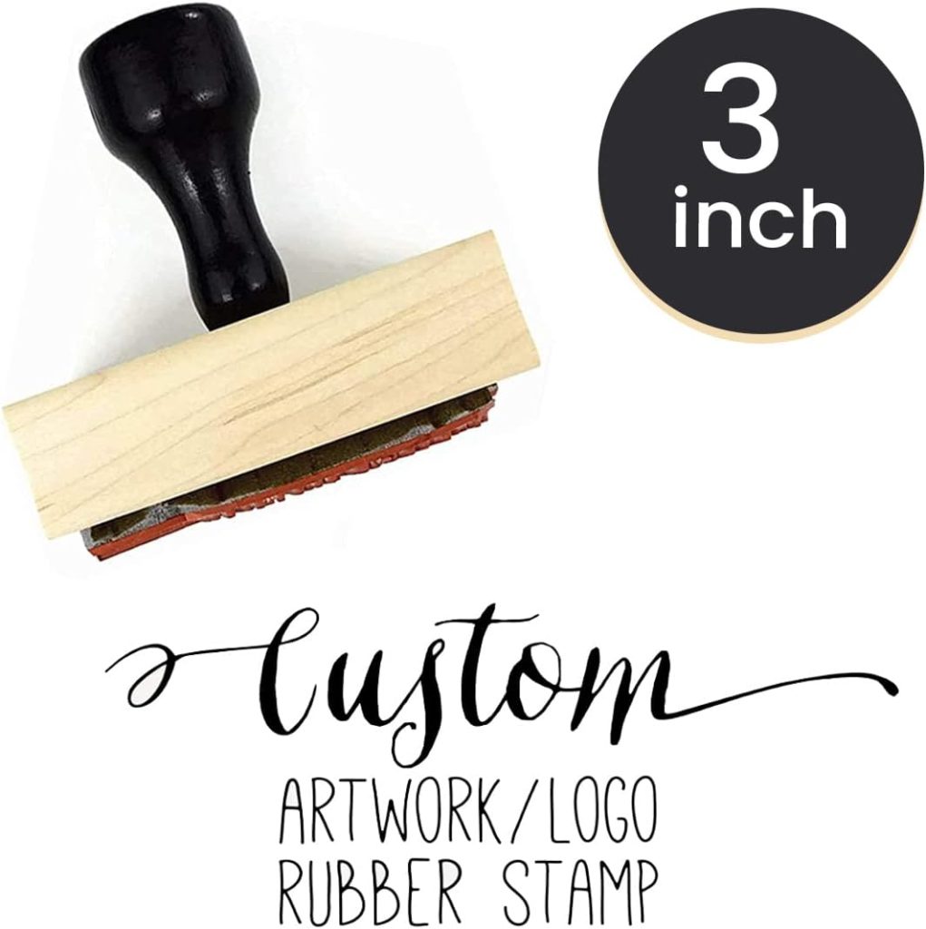 A 3-inch custom rubber stamp with a wooden handle is shown, perfect for adding your unique touch to letters or crafts—ideal for marking items from A Home to Share. Text reads "custom artwork/logo rubber stamp.