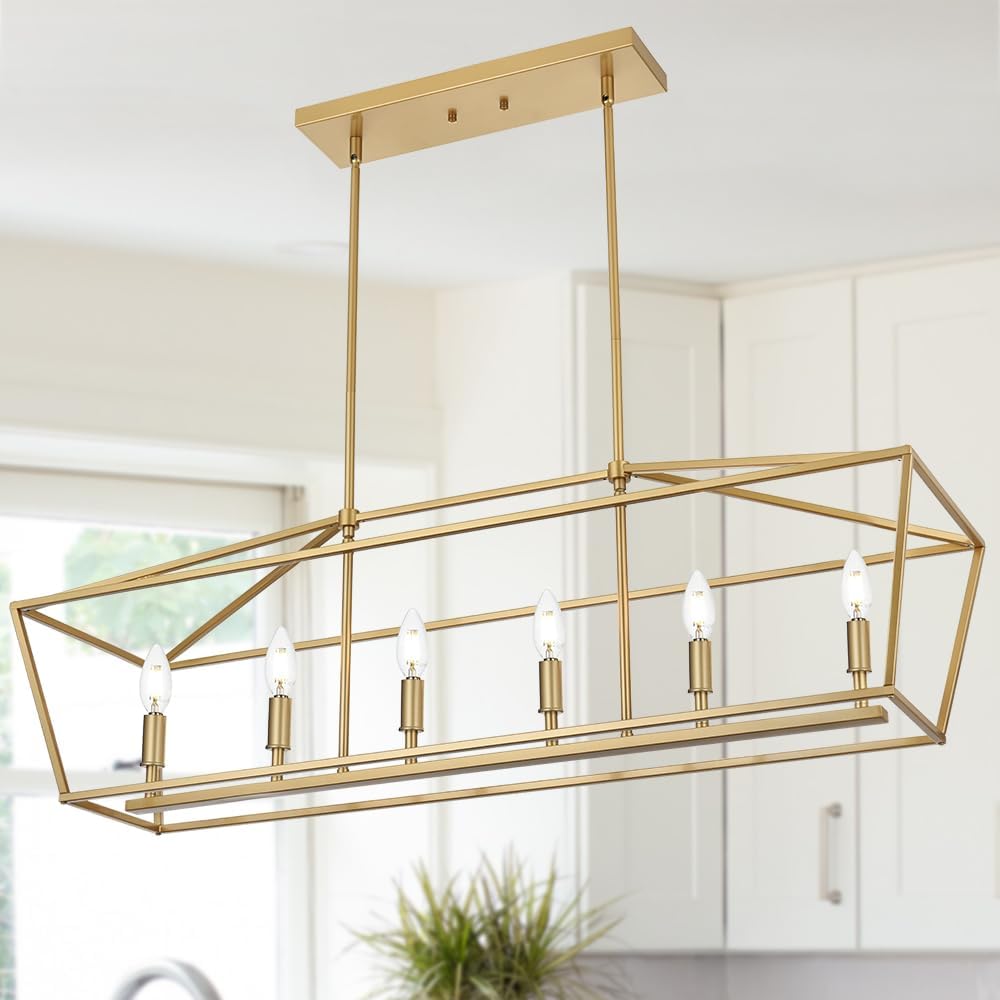 Rectangular gold metal chandelier with six exposed candle-style light bulbs, suspended from the ceiling in a modern kitchen.