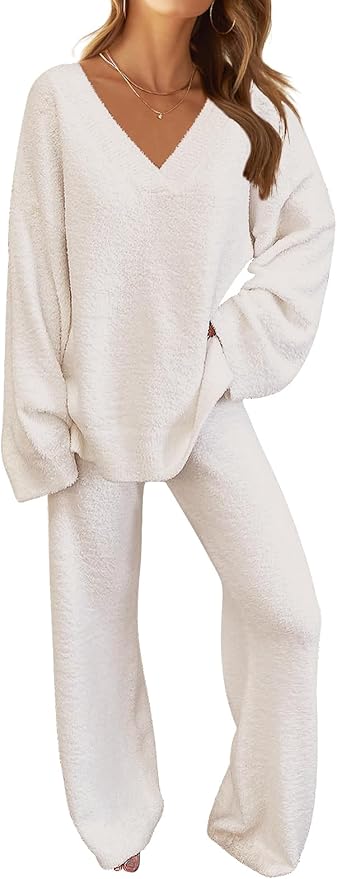 Woman wearing a loose-fitting, cream-colored, two-piece loungewear set with long sleeves and wide-leg pants—perfect for relaxing or scoring major savings during Amazon Prime Big Deal Days.