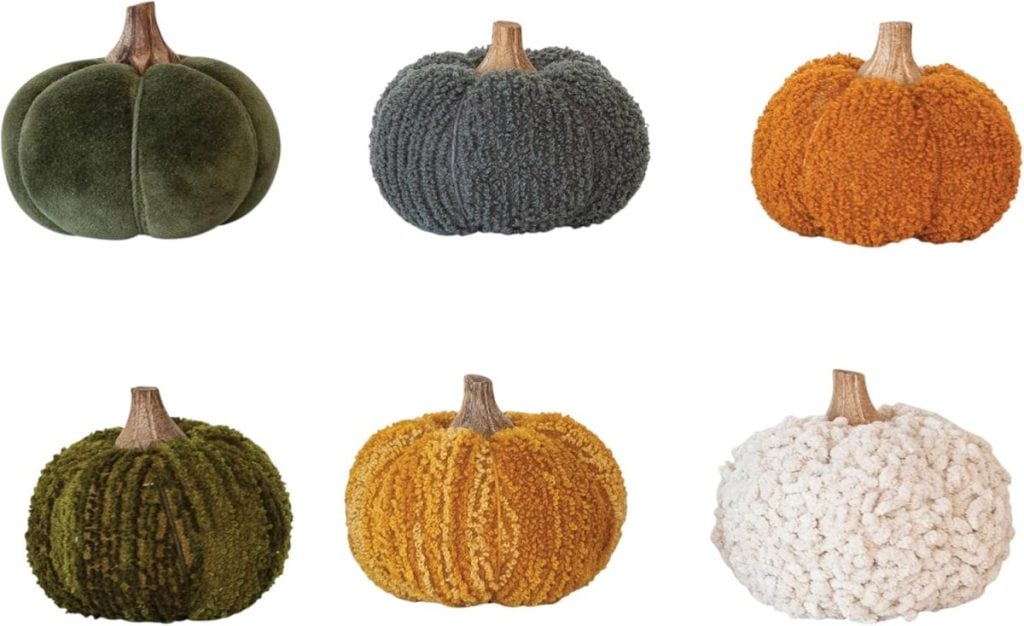 Six decorative fabric pumpkins in various shades of green, gray, orange, yellow, and white, each with a textured surface and a brown stem, arranged in two rows.