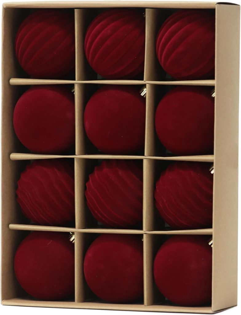A box containing twelve red Christmas ornaments, separated into individual compartments by cardboard dividers—perfect for adding festive cheer or gifting during Amazon Prime Big Deal Days.