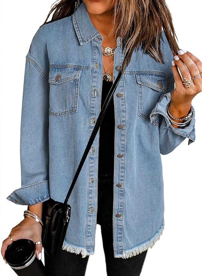 Woman wearing a light blue denim button-up shirt with chest pockets, holding a black cup, accessorized with rings, layered necklaces, and a black crossbody bag—perfect inspiration for Amazon Prime Big Deal Days shopping.