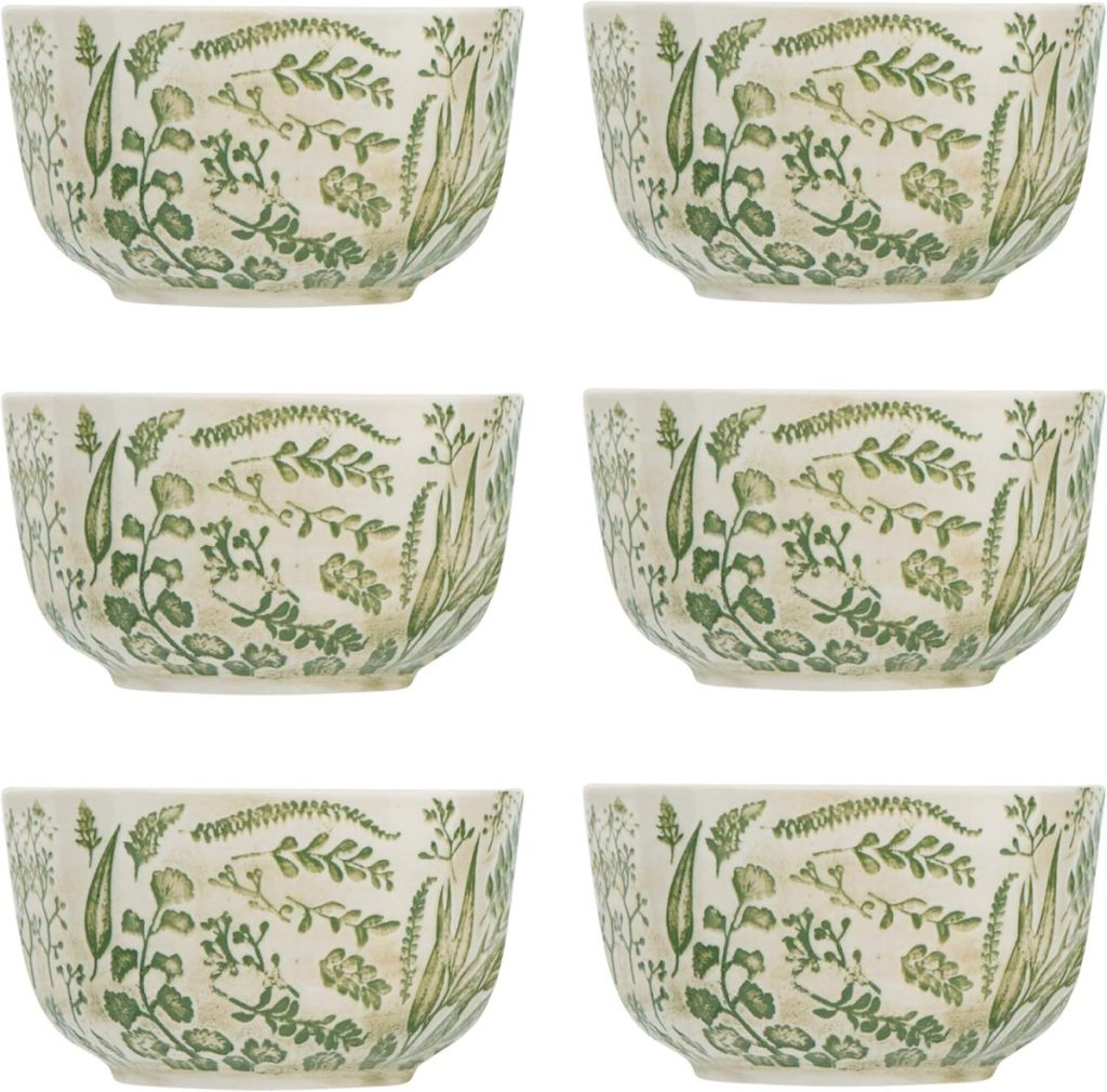 Six ceramic bowls with green botanical patterns, arranged in two rows of three against a white background.