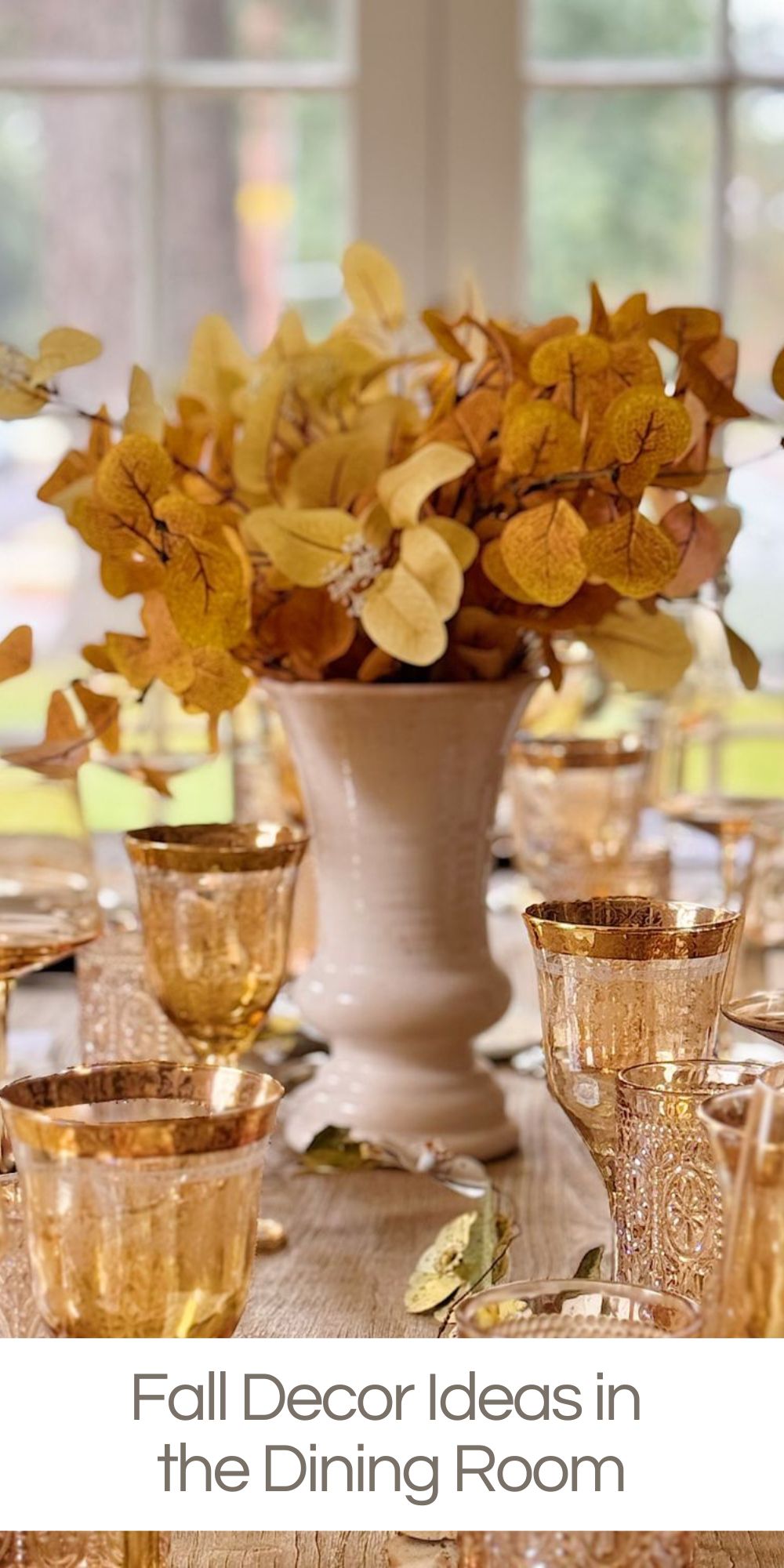 Today, I’m sharing how I decorated our dining room with fall decor ideas. This year’s dining room design combines my fall color palette of warm gold and soft orange with a mix of my handmade pottery and purchased dinnerware.