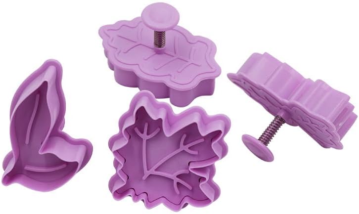 Four purple plastic leaf-shaped cookie cutters of different designs are shown, each with a plunger for pressing patterns into dough—perfect for decorating pumpkin pie crusts.