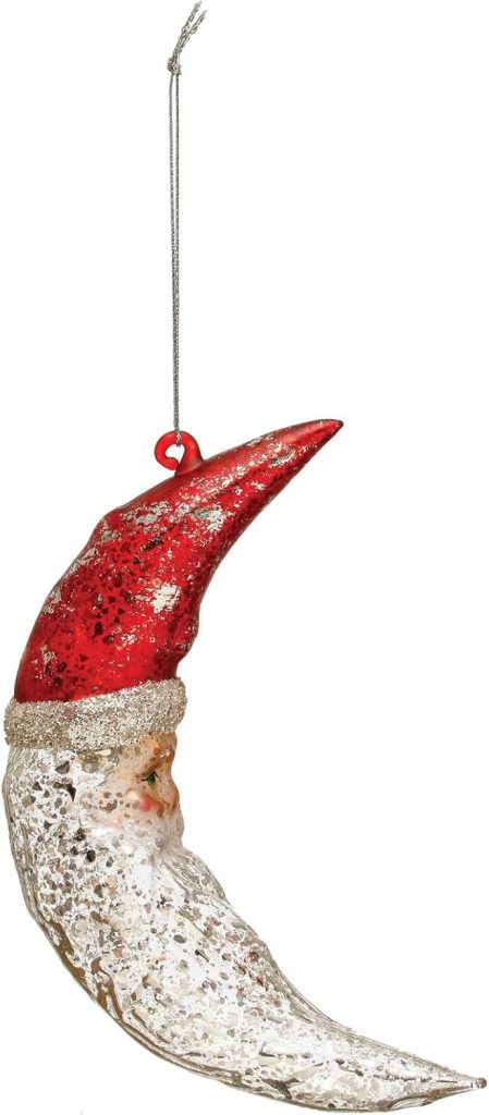 Glass ornaments shine with festive charm in this crescent moon Christmas ornament, featuring a glittery red Santa hat, silver accents, and a silver string for hanging.